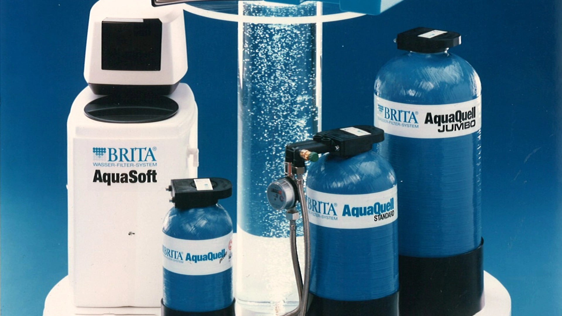 BRITA AquaSoft and AquaQuell early water filtration systems displayed on blue background.