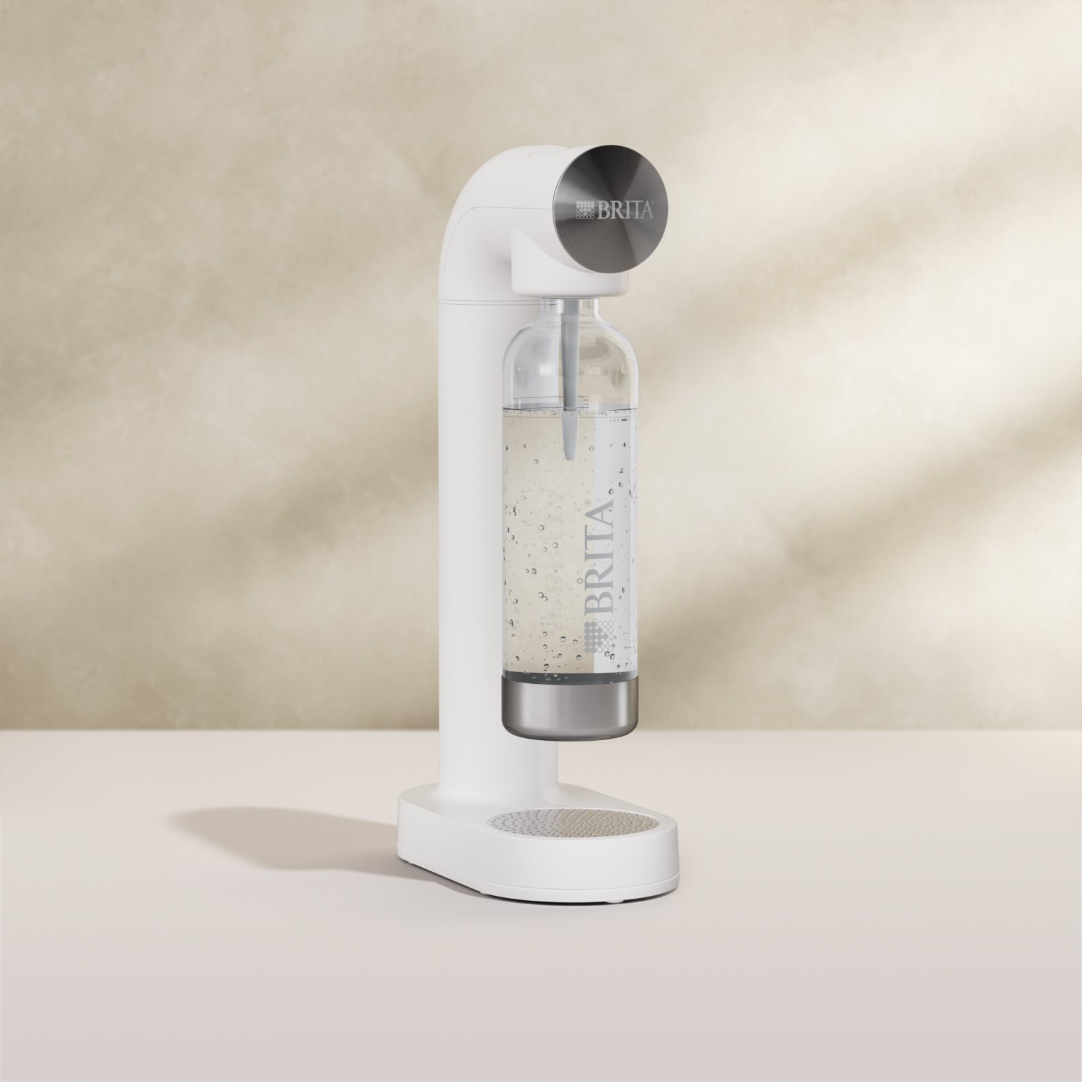 BRITA sodaONE Sparkling Water Maker in white on a beige background